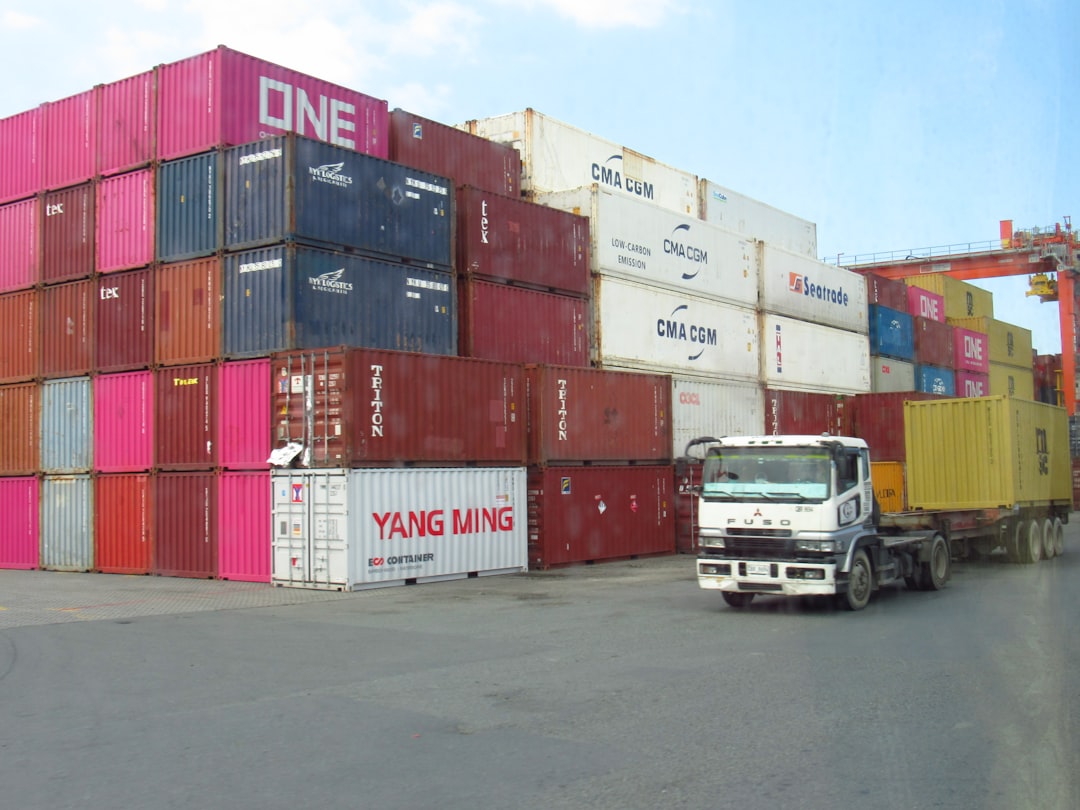 Road freight truck and shipping containers for international CMR transport